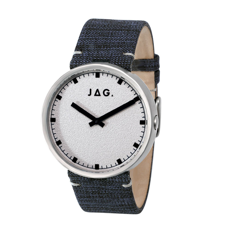 Wristwatch with a white face, black hands, and a dark fabric strap.