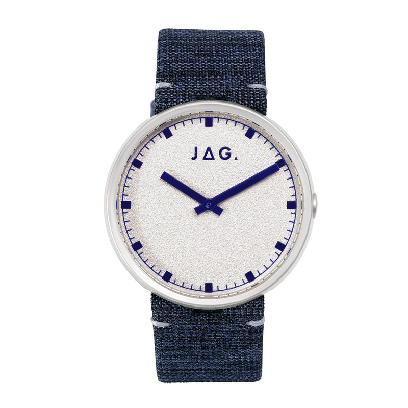 Wristwatch with a white face, blue hands and markers, and a dark fabric strap.