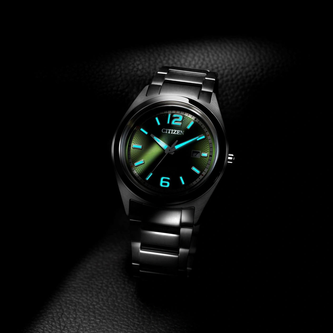 Citizen Super Titanium AW1641-81X men's watch green dial silver titanium bracelet lifestyle view