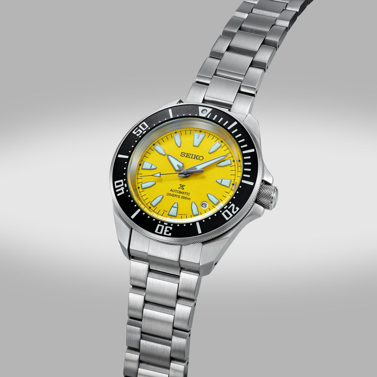 Seiko Prospex Asian Resorts Limited Edition HBB003K with yellow sand-textured dial and black bezel, angled view — Watch Direct Australia