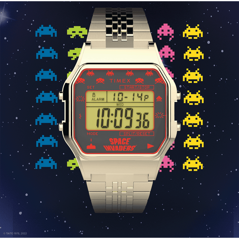 Retro-style digital wristwatch with Space Invaders-themed display and border graphics.