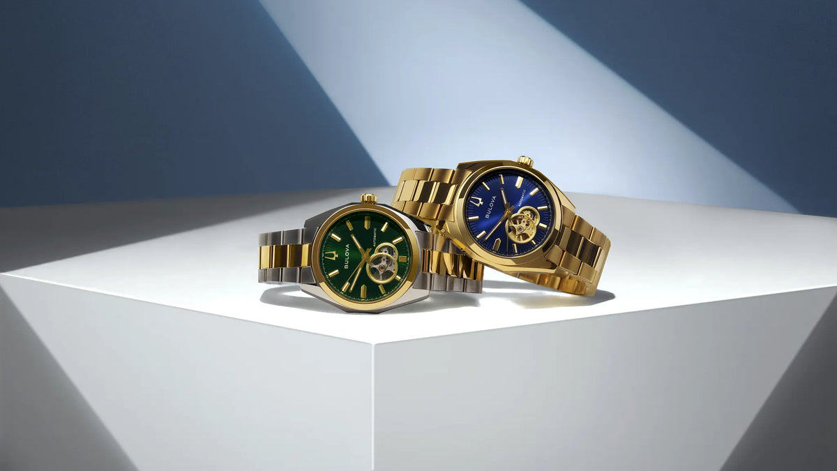 Bulova Surveyor 97A203 automatic men's watch with blue dial and gold-tone stainless steel bracelet — lifestyle view
