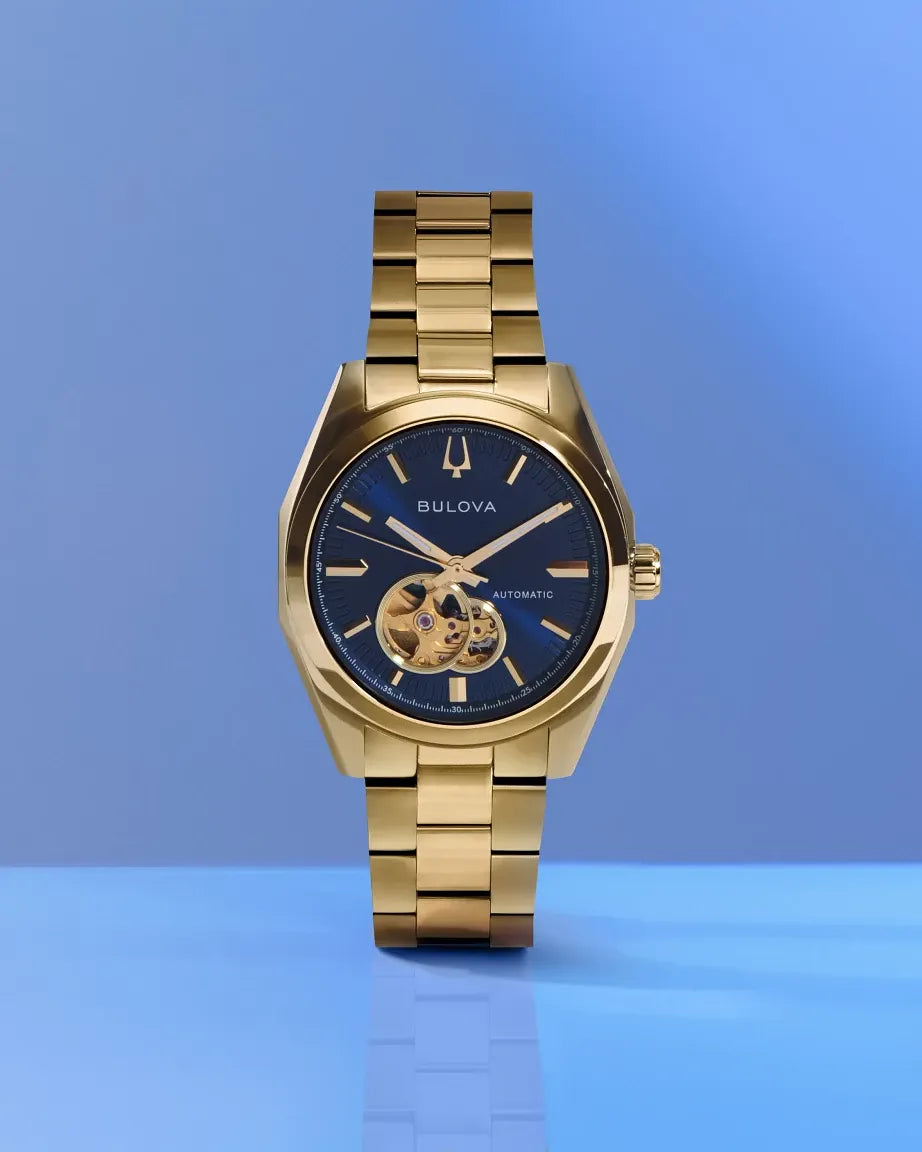 Bulova Surveyor 97A203 automatic men's watch with blue dial and gold-tone stainless steel bracelet — strap detail