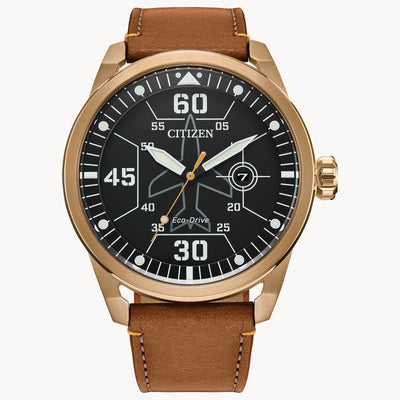 Gold-toned Citizen wristwatch with a black dial and brown leather strap.