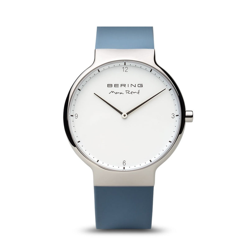 Minimalist wristwatch with a white face and blue band.