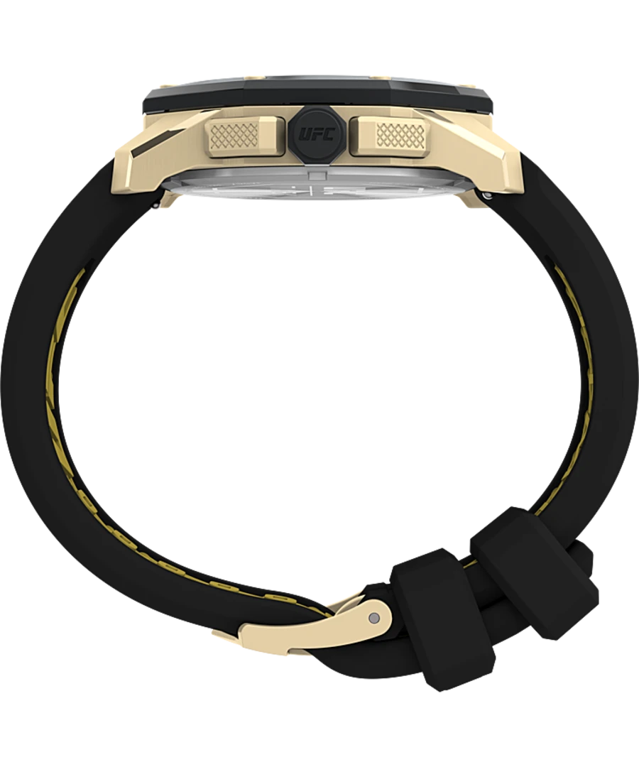 Gold-toned wristwatch with a black rubber strap.