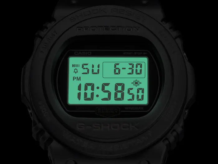 Digital watch display showing time, date, and day of the week.