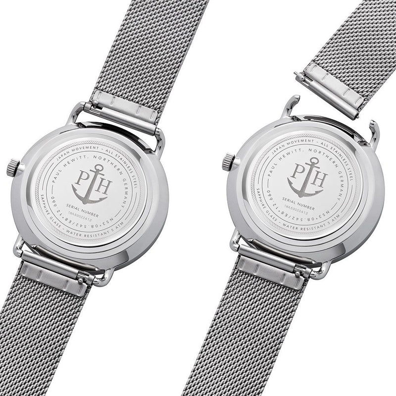 Two silver wristwatches with mesh bands and anchor logos on their casebacks.