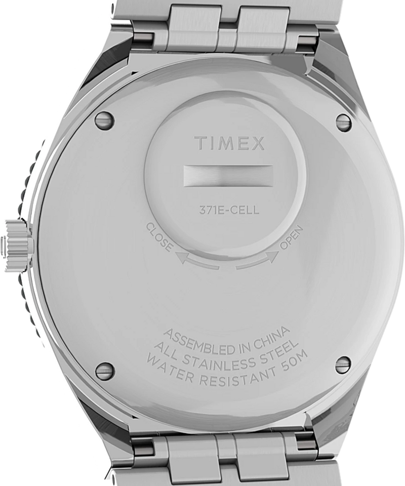 Back of a Timex watch with visible battery compartment and water resistance information.