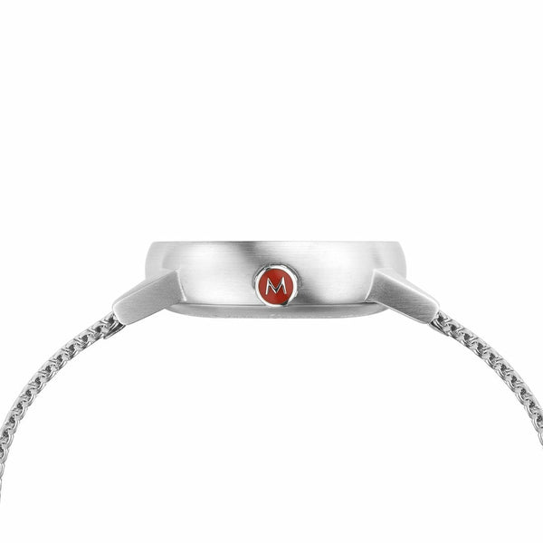 Side view of a sleek silver wristwatch with a red logo on its crown.