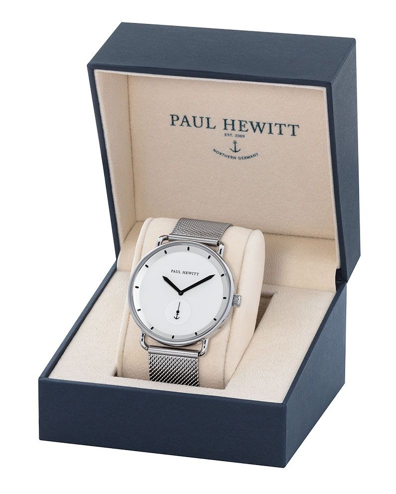 Wristwatch with a silver mesh band in a Paul Hewitt presentation box.