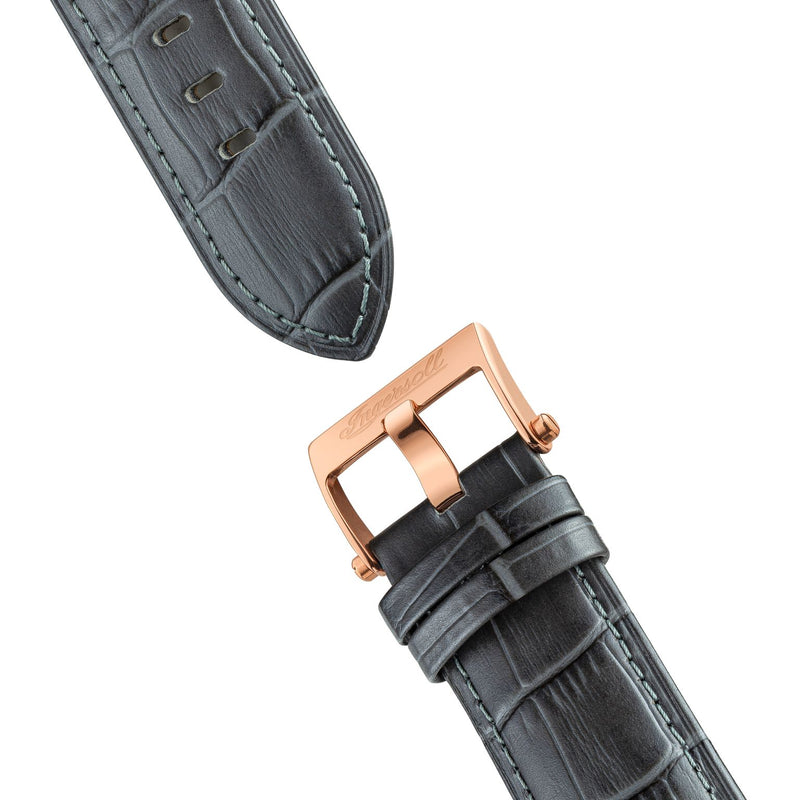 Black leather watch strap with a rose gold buckle.