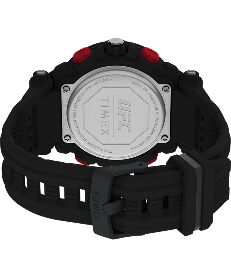 Back of a black and red sports watch with a visible metal case back.