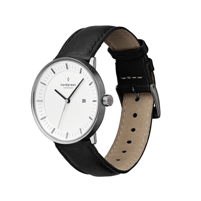 Sleek wristwatch with a white dial, silver case, and black leather strap.