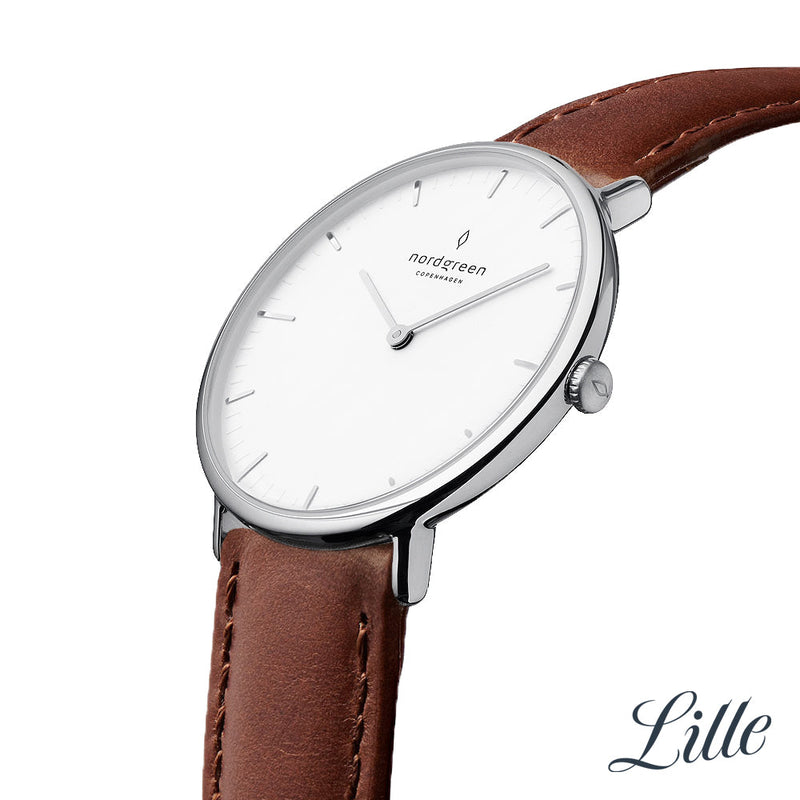 Sleek wristwatch with a white face, silver case, and brown leather strap.