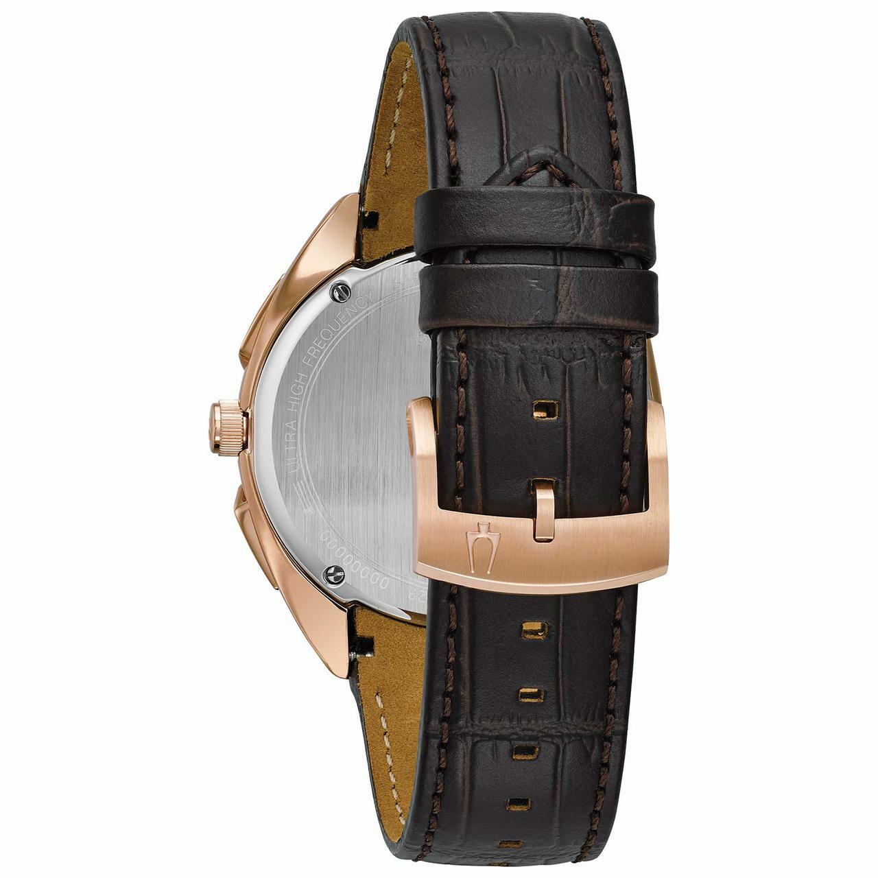 Wristwatch with a black leather strap and rose gold-colored case.