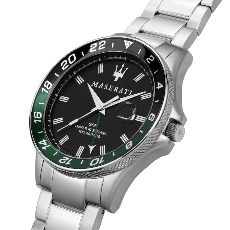 Maserati wristwatch with a black dial and green-black bezel on a silver metal bracelet.