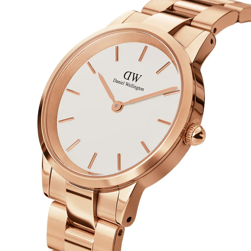 Rose gold wristwatch with a white face and minimalist design.