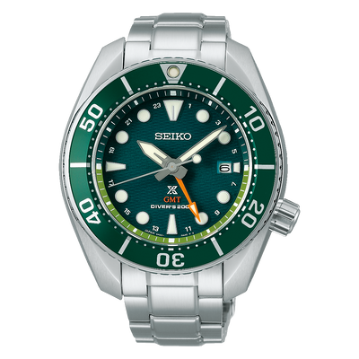 Seiko diver’s watch with a green dial and silver metal bracelet.