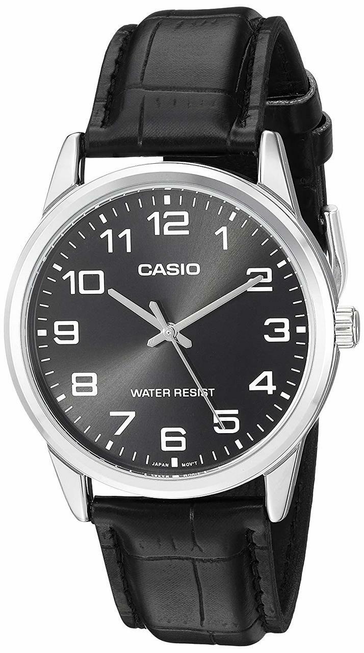 Casio wristwatch with a black leather strap and round silver case.