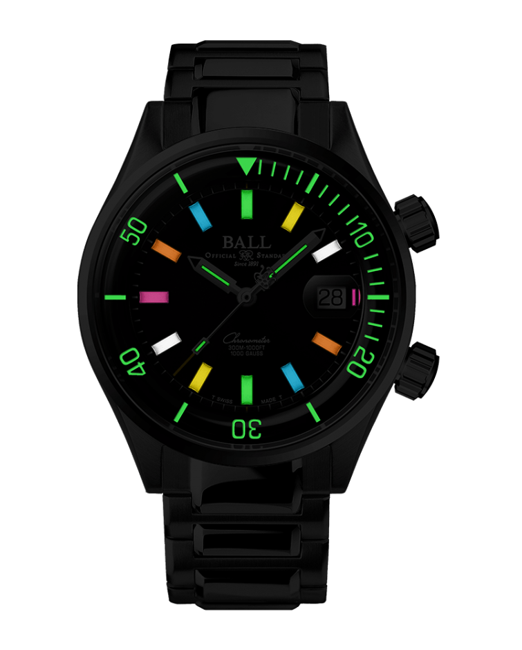 Black wristwatch with colorful luminous markers on the dial and bezel.