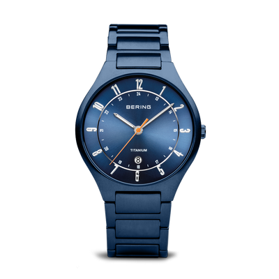 Blue wristwatch with a round face and metal bracelet.