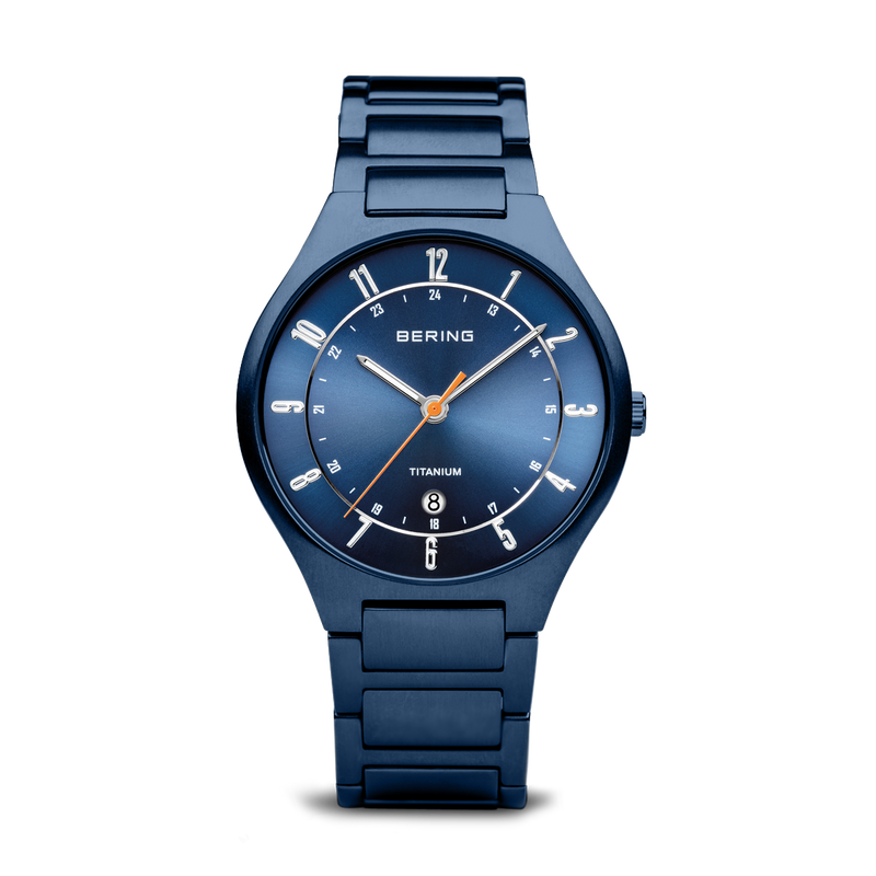 Blue wristwatch with a round face and metal bracelet.