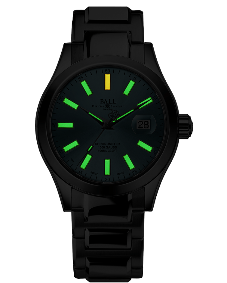Black wristwatch with luminous green and yellow hour markers on its face.