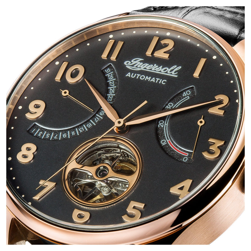 Luxury automatic wristwatch with a black dial and rose gold accents.