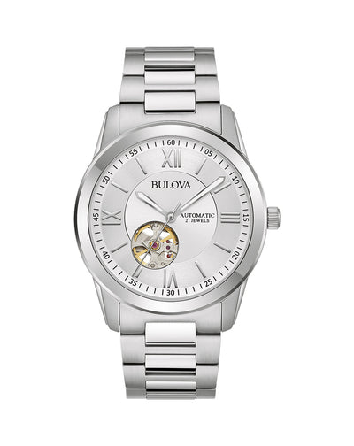 Silver-toned wristwatch with a white dial and visible mechanical movement.