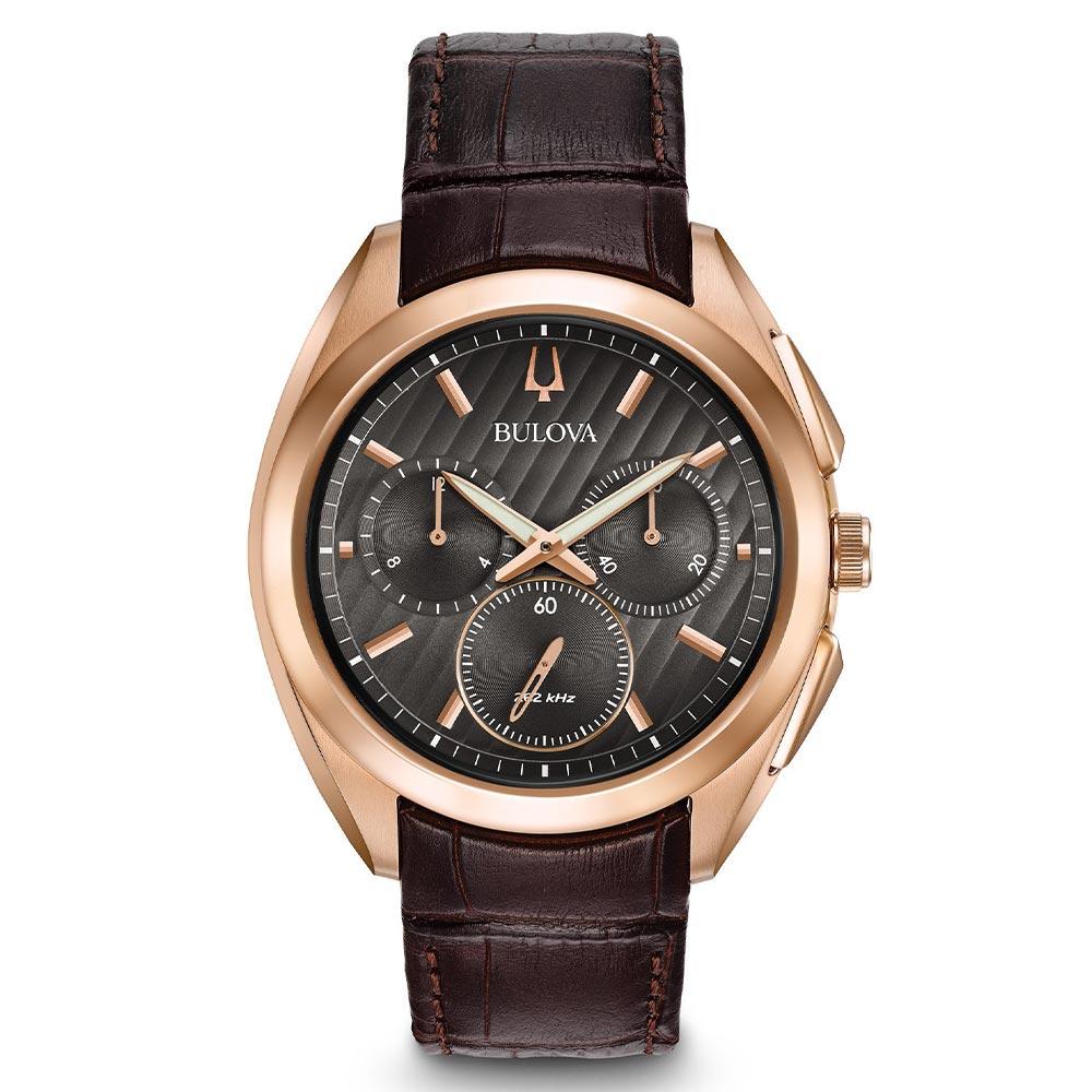 Elegant rose gold Bulova wristwatch with a dark brown leather strap and black dial.