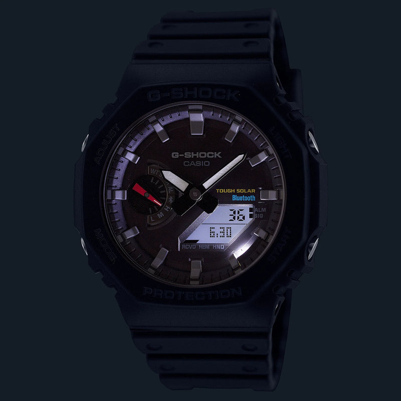 G-Shock digital-analog wristwatch with a black case and illuminated display.