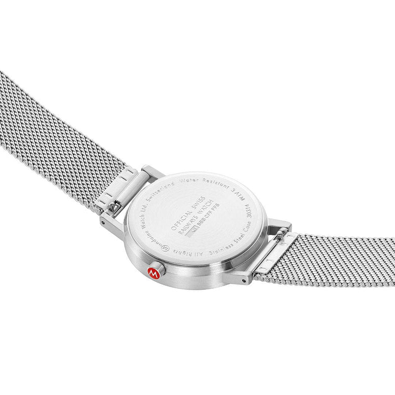 Wristwatch with a silver mesh band and round face.