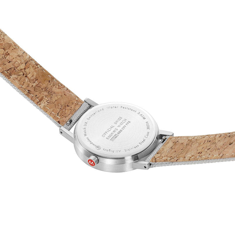 Wristwatch with a cork strap and silver case.