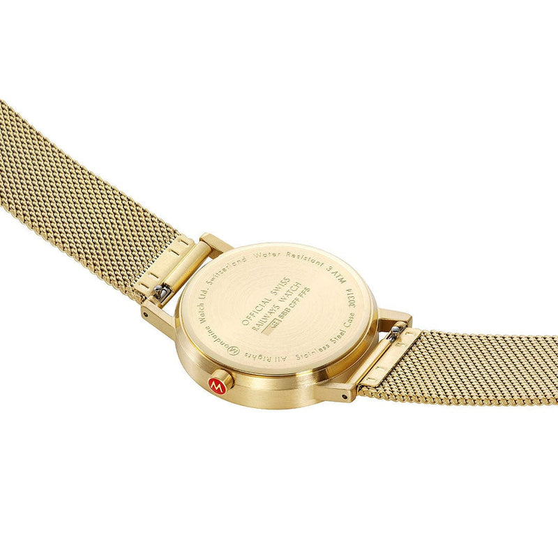 Gold-toned wristwatch with a mesh metal band.