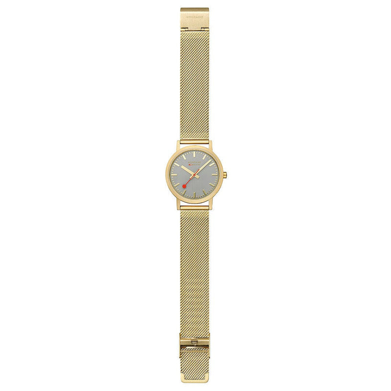 Gold-toned wristwatch with a mesh metal band and colorful dial face.