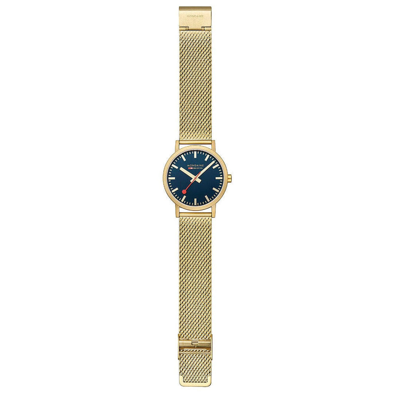 Gold-toned wristwatch with a blue dial and mesh metal band.