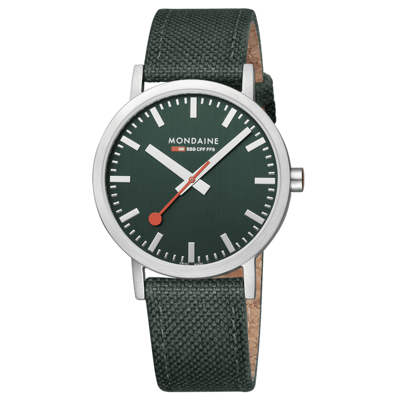 Wristwatch with a green dial and fabric strap.