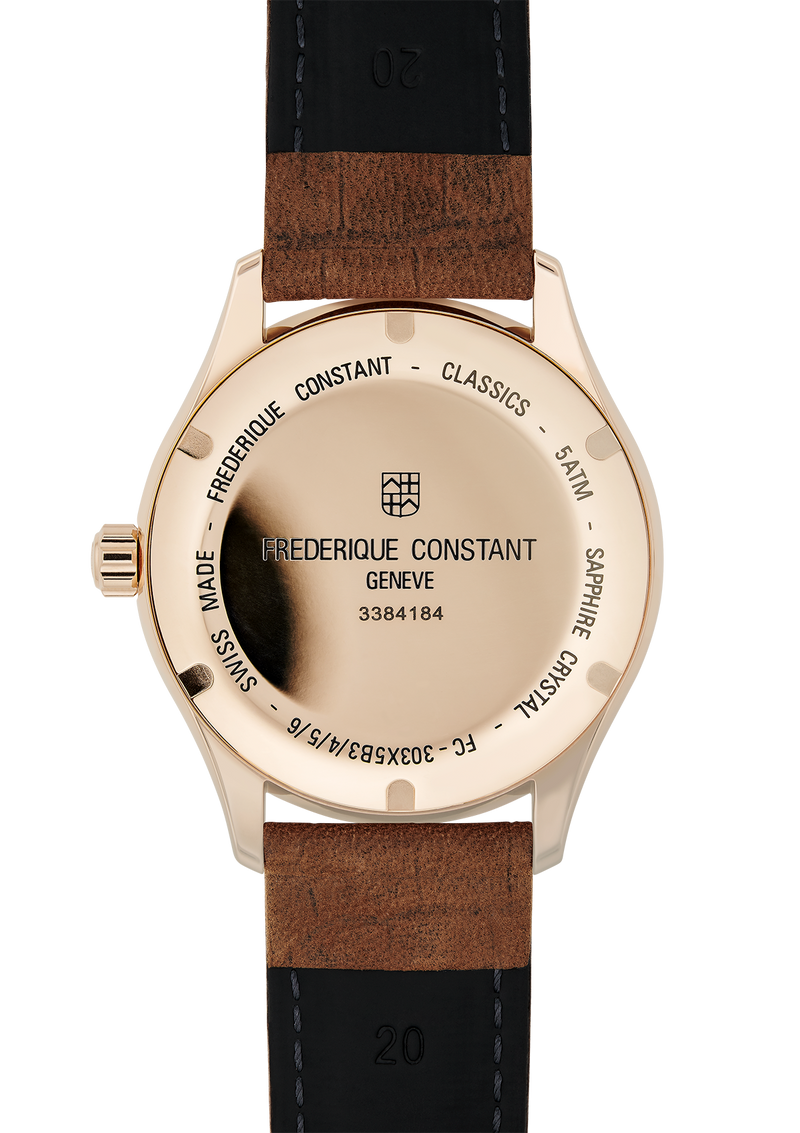 Luxury wristwatch with a rose gold case and two-tone leather strap.