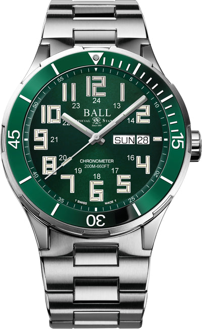 Stainless steel wristwatch with a green dial and bezel.