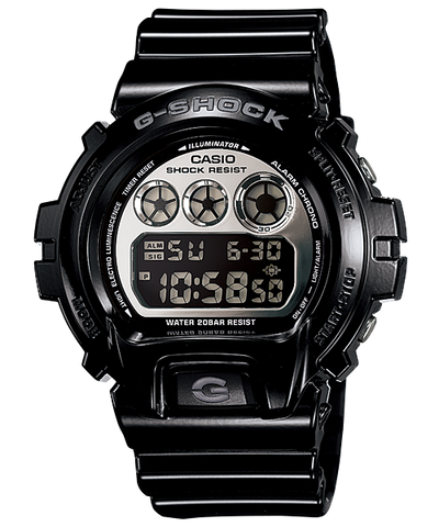 Black G-Shock digital watch with a metallic face displaying time and date.