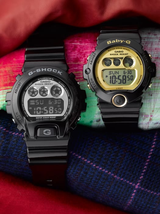 Two digital wristwatches, one G-Shock and one Baby-G, displayed side by side.