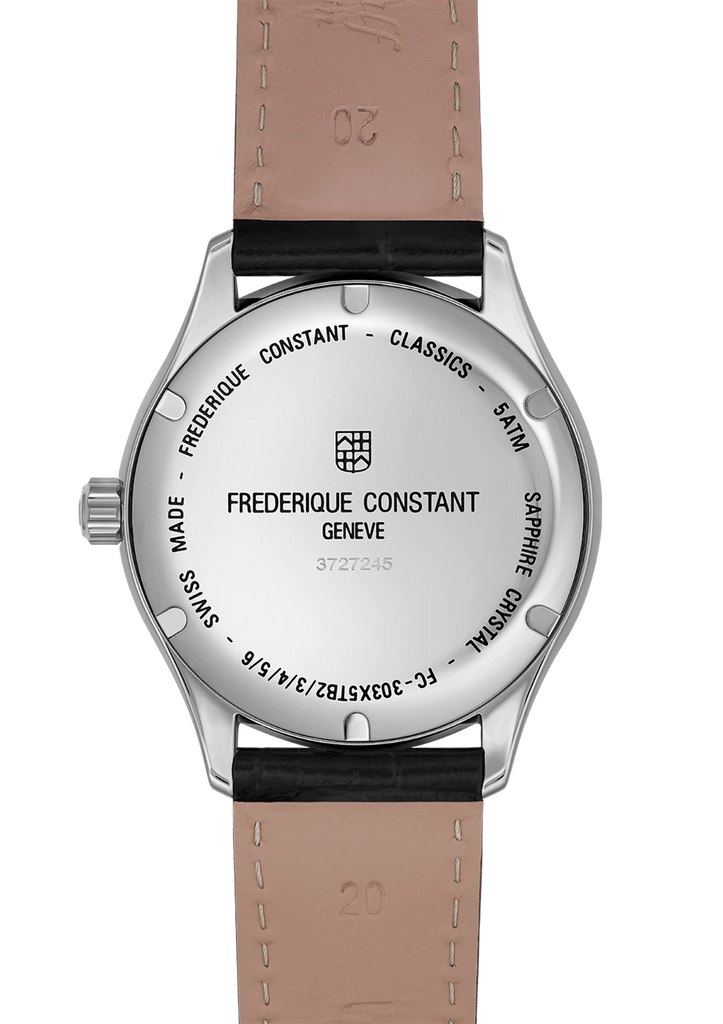 Wristwatch with a silver case, black leather strap, and ’Frederique Constant’ branding on the back.