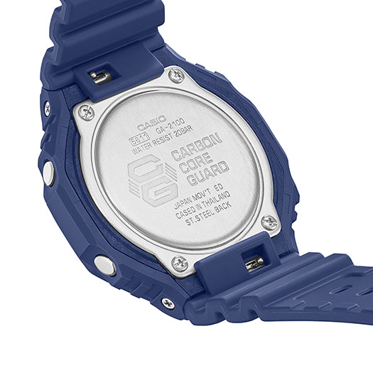 Back of a blue digital wristwatch showing its metal case cover with engraved text.