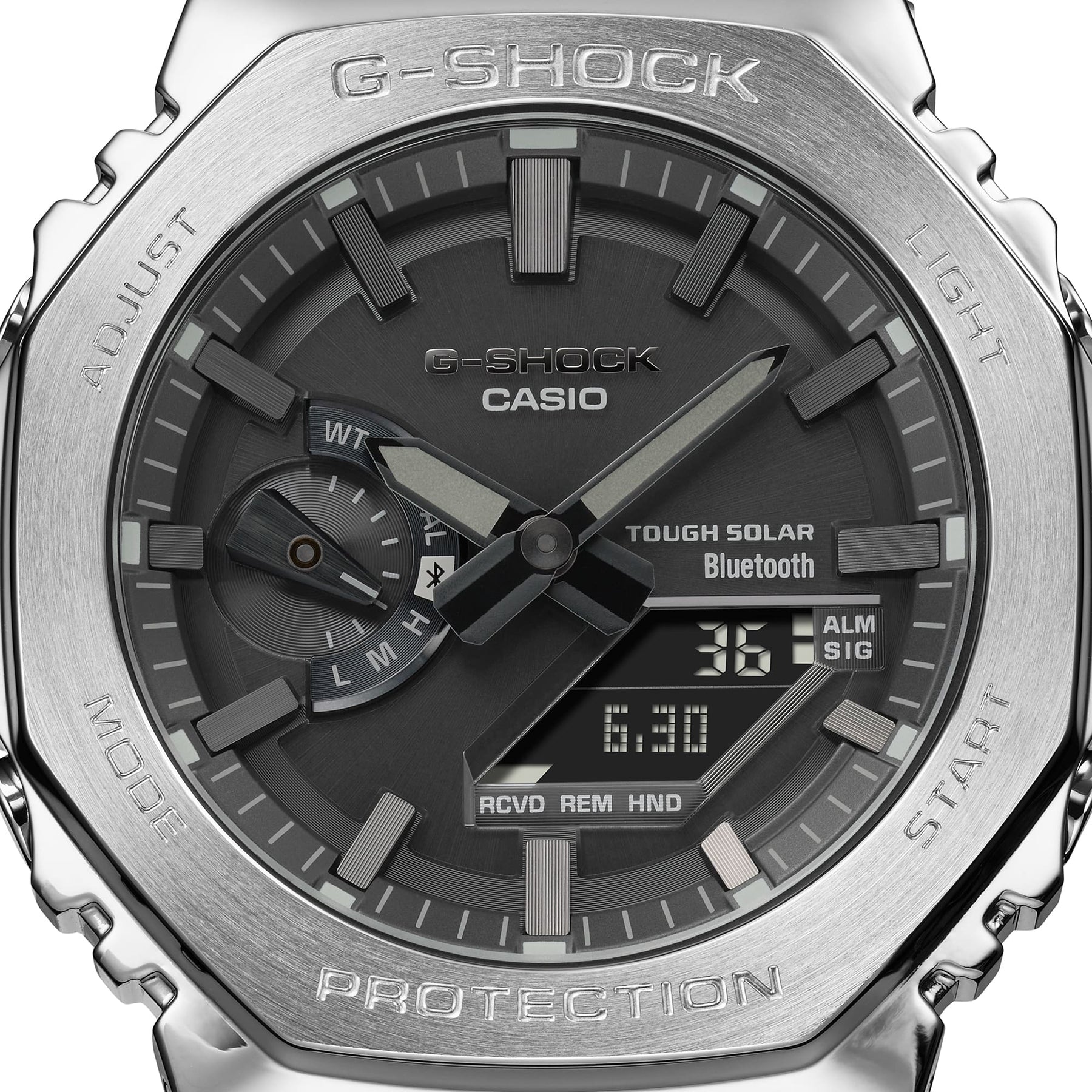 G-Shock watch face with digital and analog displays, featuring a rugged metallic bezel.