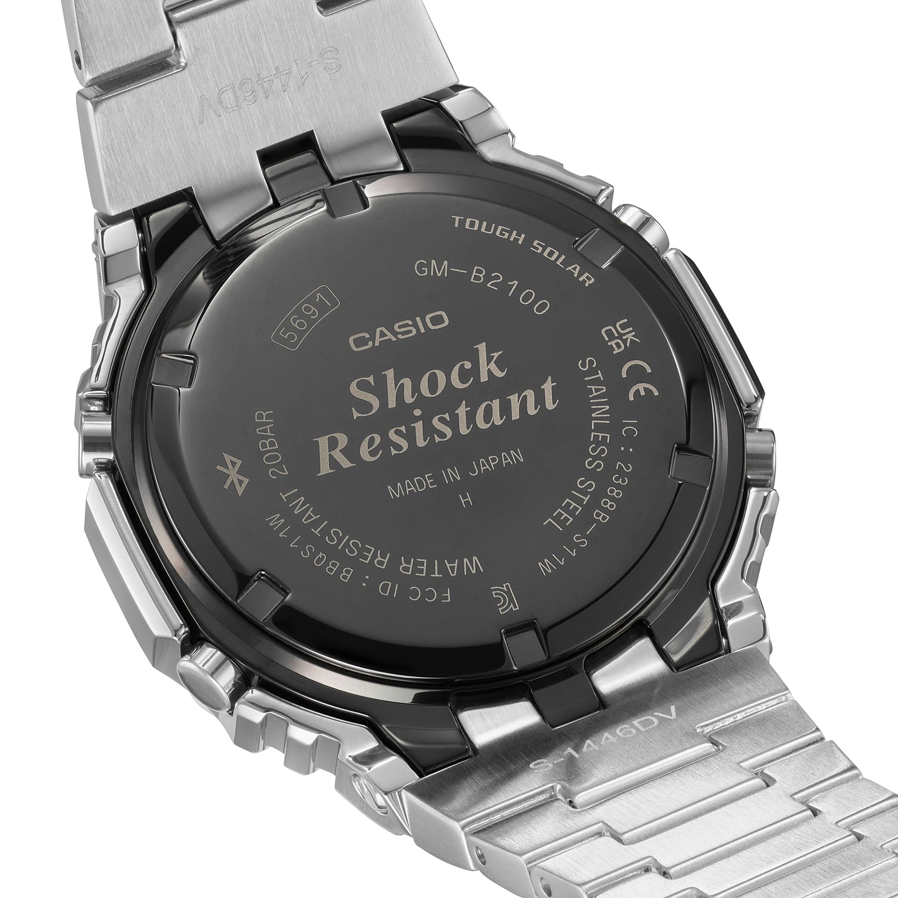Back of a Casio G-Shock watch displaying ’Shock Resistant’ and other technical details.