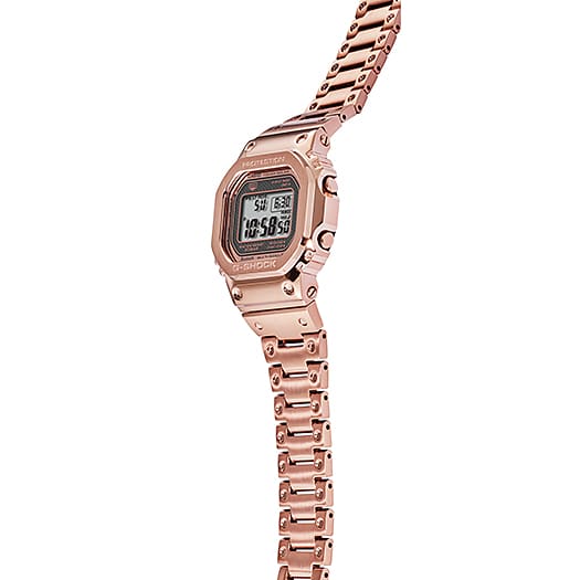 Rose gold digital wristwatch with a metallic band and rectangular face.