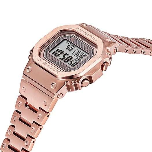 Rose gold digital wristwatch with a square face and metal bracelet.