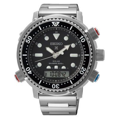 Seiko dive watch with analog and digital displays, featuring a black dial and stainless steel bracelet.