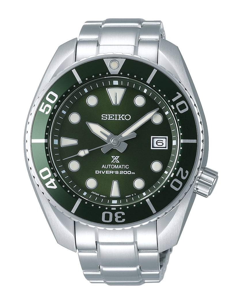 Seiko dive watch with a green dial and stainless steel bracelet.